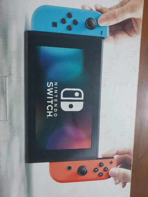 NINTENDO SWITCH+PLUSIEURS ACCESSOIRES+3 JEUX