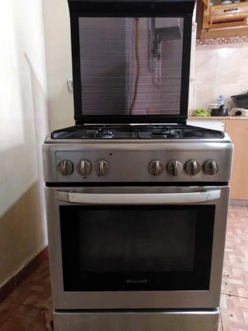 Pack Déménagement : Lave-linge 7kg  (occasion )+ Cuisinière Inox  avec ventilation (occasion ) + Table & 6 Chaises (occasion )
