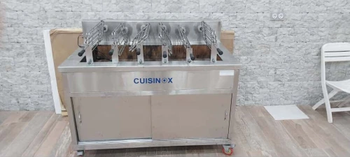 Rôtissoire à la braise, 6 bras, inox 100%, état neuf.