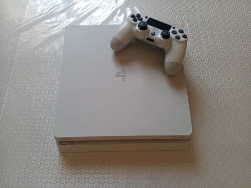 PS4 slim 1T version 13.02 d'occasion à Vendre
