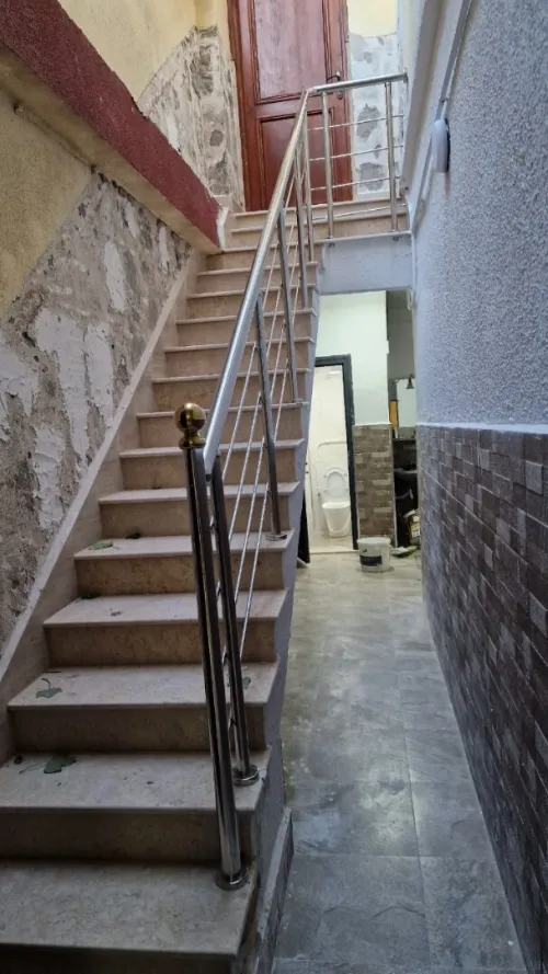 Rampes d'escalier en inox & cabine de douche