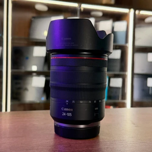 Canon 24-105 f4 RF en excellent etat avec deux bouchons parasoleil .