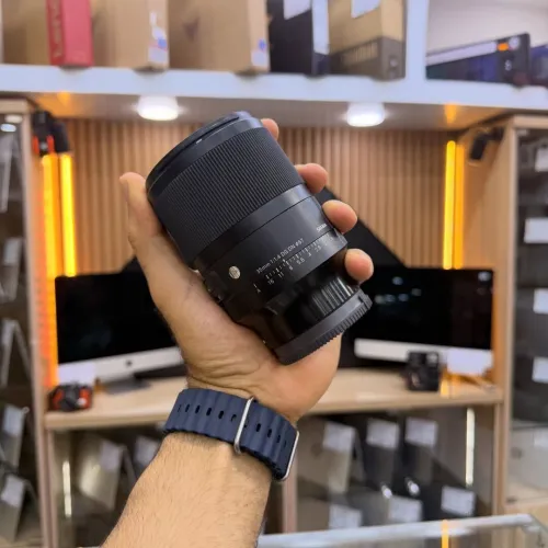 Sigma 35mm 1.4 DG DN Sony E-mount en excellent etat avec deux bouchons