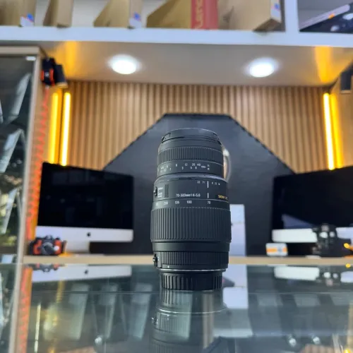 Objectif SIGMA EF-mount 70-300mm 1:4-5.6 en bon état avec bouchon