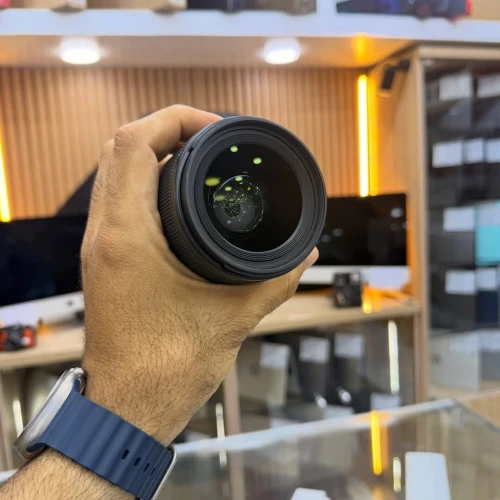 Sigma 35mm 1.4 DG DN Sony E-mount en excellent etat avec deux bouchons