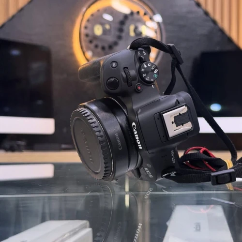 Canon R50 avec bague RF-EF en excellent état