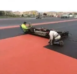 Sol coulé pour pistes d'athlétisme