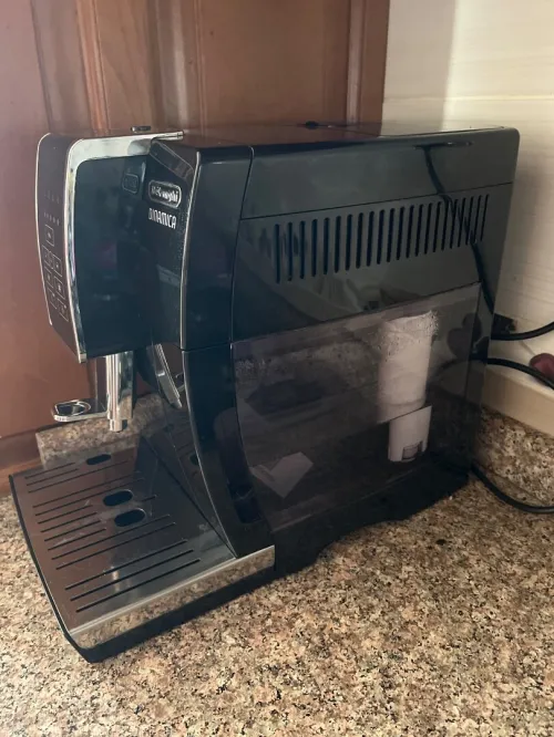 Machine à café broyeur Delongui