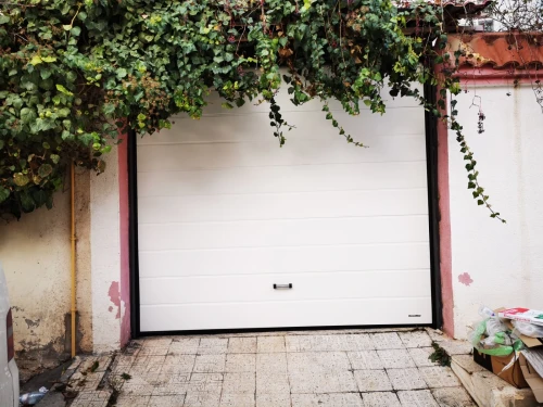 Porte Sectionnelle industrielle et résidentielle en panneau sandwich (أبواب  مقطعية صناعية منزلية)