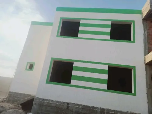 Décoration façade extérieure en monocouche
