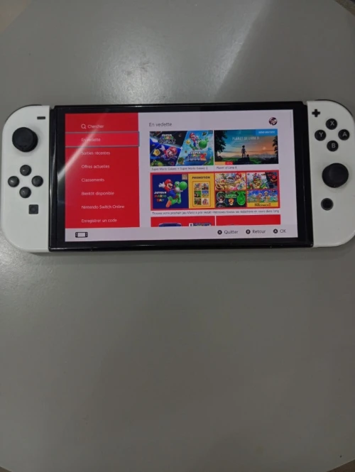 Nintendo Switch OLED 64GB White (  Avec tous les accessoires )
