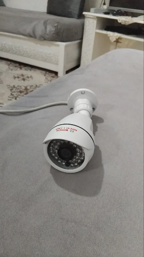 camera de surviellance et systeme d'alarme