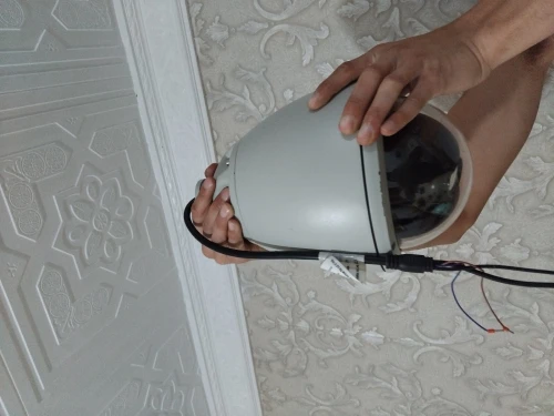 camera de surviellance et systeme d'alarme