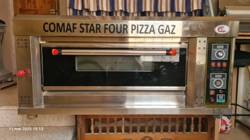 Four a gaz neuf a vendre.
