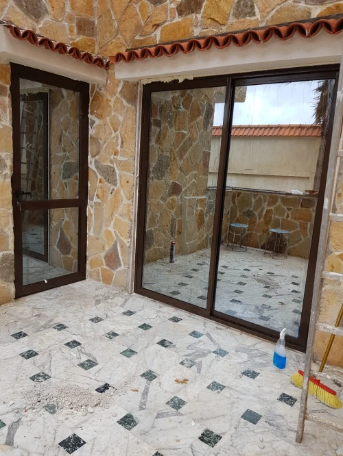 fenetre aluminium et pvc et veranda fabrication et réparation 