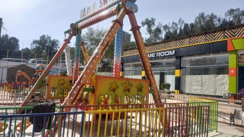 Manège et jeux d'attraction (happy siwng de 12 places adultes et enfants)