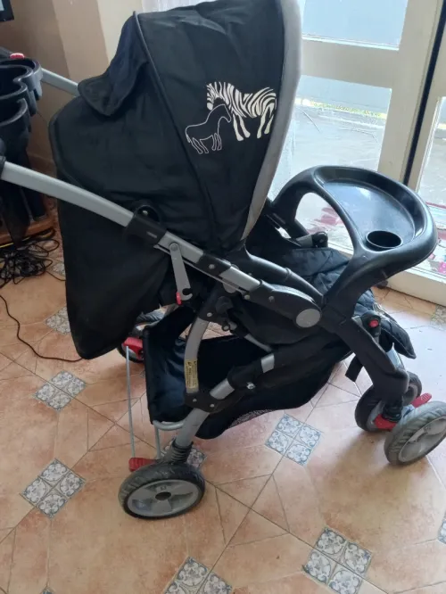 Poussette bébé pingouin 
