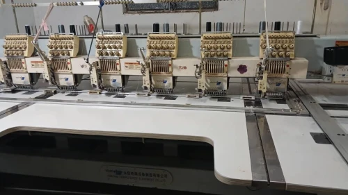 Machine broderie 6 tétes 10 tétes