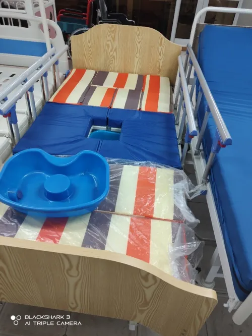 Lit médicalisé multipositions  garde robe pour soins  a domicile 