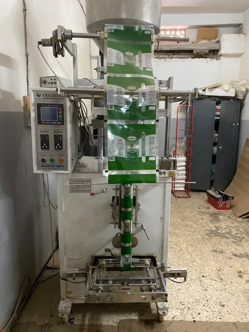 Machine de remplissage et d'emballage