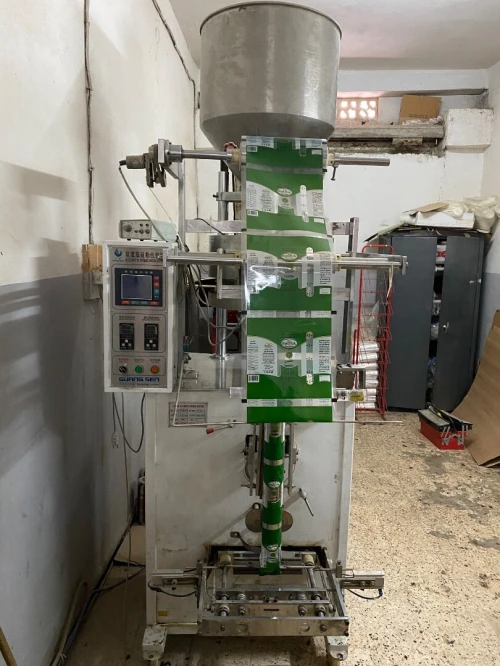 Machine de remplissage et d'emballage