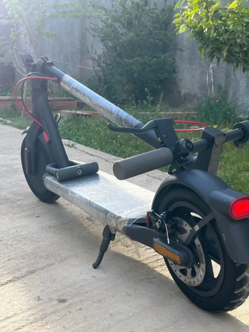 Xomi Trotinat 