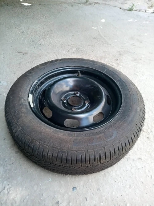 عجلة احتياطية أصلية لم تستخدم  ( Roue Good year original 185/65/15 ( pneu +jante par 15)