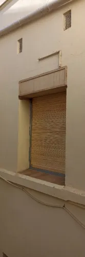 Installation et maintenance du volet bois