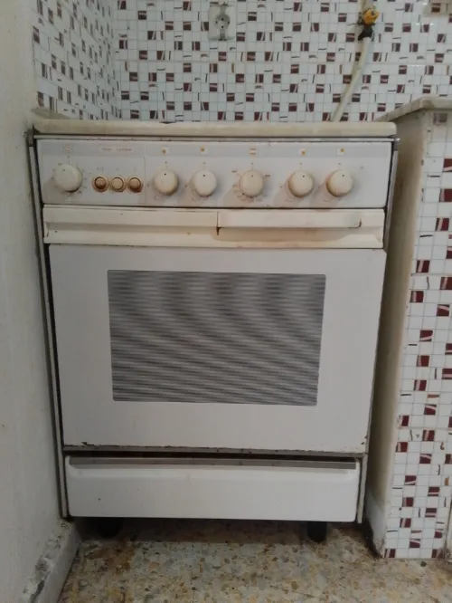 Cuisinière marque eniem 4 feux + four