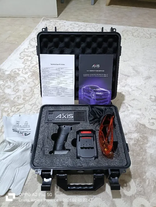 علامة AXIS Auto Technical Testing