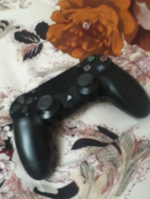 Ps4 fat etat neuf 500 go + Manette version 12.5