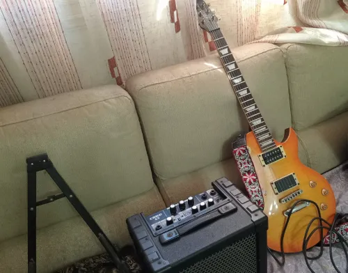 Guitare +ampli Roland Cube 15w
