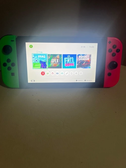 Nintendo switch non flashes Originale +Console vert et rouge, Avec le chargeur