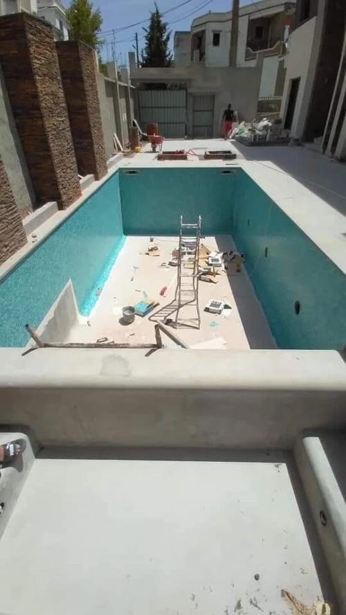 Construction des piscines مسابح