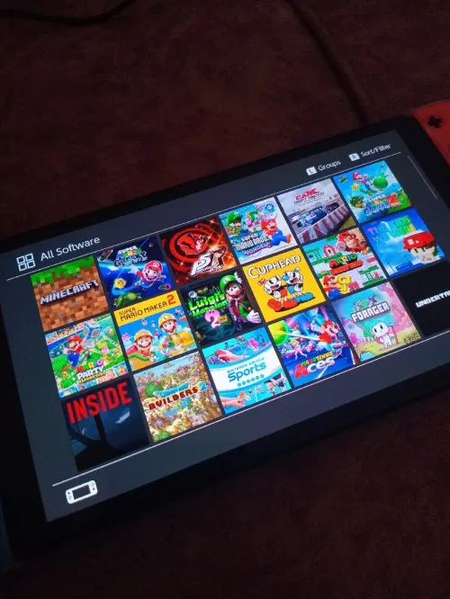 Nintendo switch Oled flache 10/10 + 35 jeux (toute accessoires)
