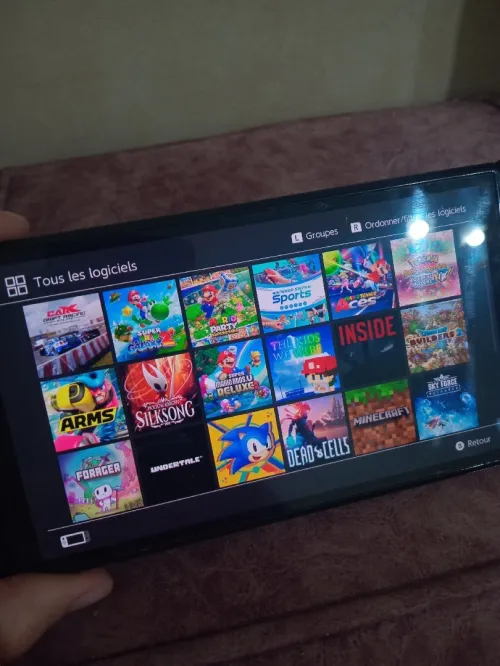 Nintendo switch oled flache wm3amar bles jeux