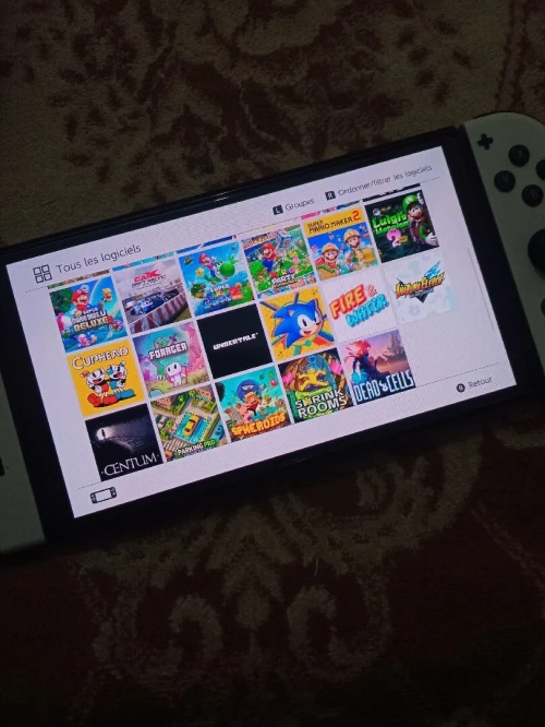 Nintendo switch oled flache + chargeur neuf + 35 jeux