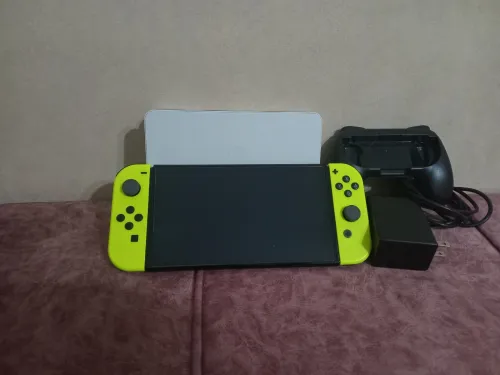 Nintendo switch oled état neuf +40 jeux