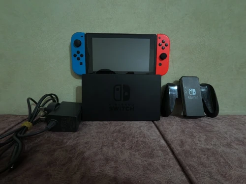 Nintendo switch flache + 35 jeux + les accessoires