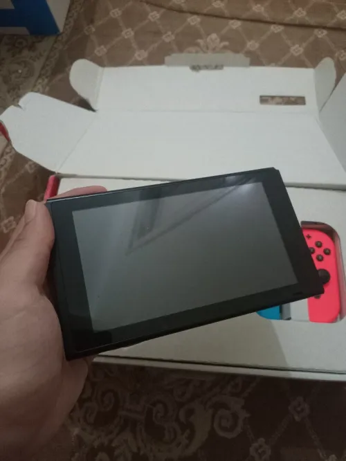 Nintendo switch V2 flache 10/10 cartona +35 jeux