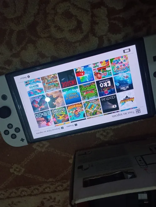 Nintendo switch Oled cartona flache + 35 jeux