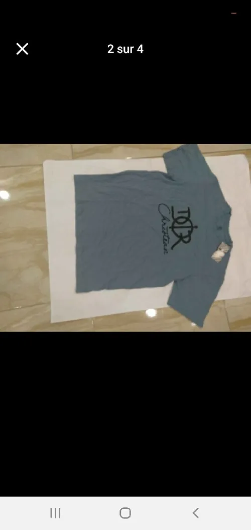 un beau T-SHIRT marque CHRISTIAN DIOR 100% COTTON