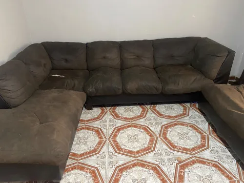 Fauteuil en L avec pouf