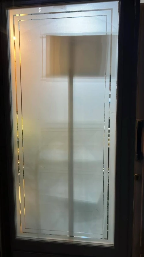 Habillage vitrine autocollant sablé