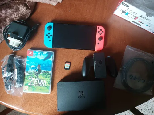 Nintendo switch Oled non flashée + 2 jeux