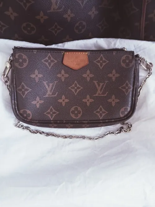 Petite pochette vintage de marque en cuir