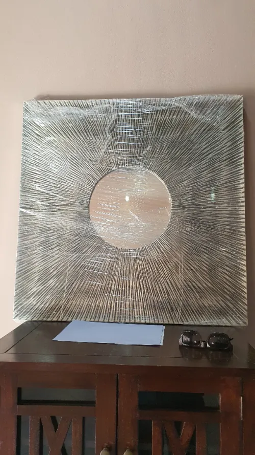 Ensemble de deux tableaux design et un miroir soleil de très bonne qualité