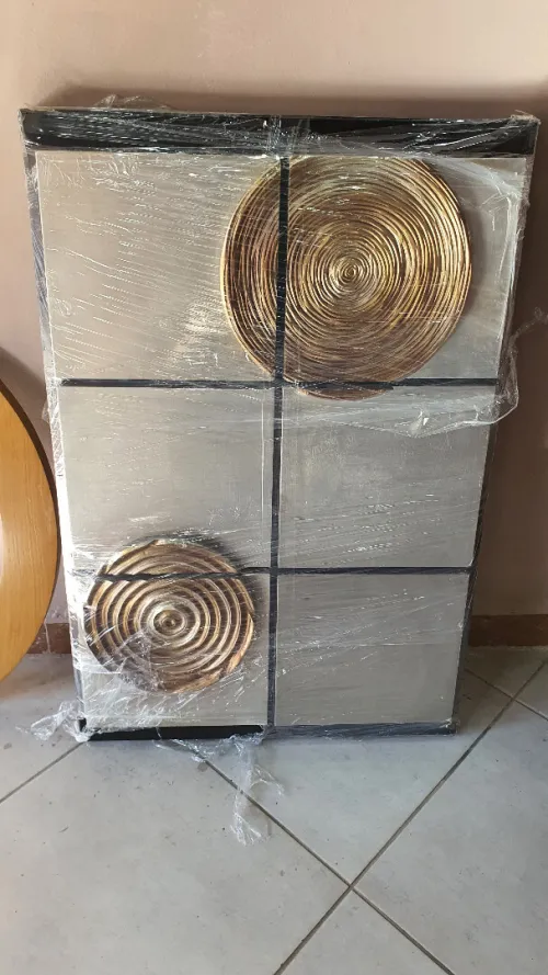 Ensemble de deux tableaux design et un miroir soleil de très bonne qualité