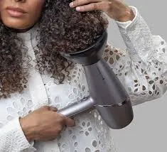 sèche-cheveux Remington AC9800 PROluxe You technologie StyleAdapt 2400W vitesse d'air atteignant 115 km/h.
