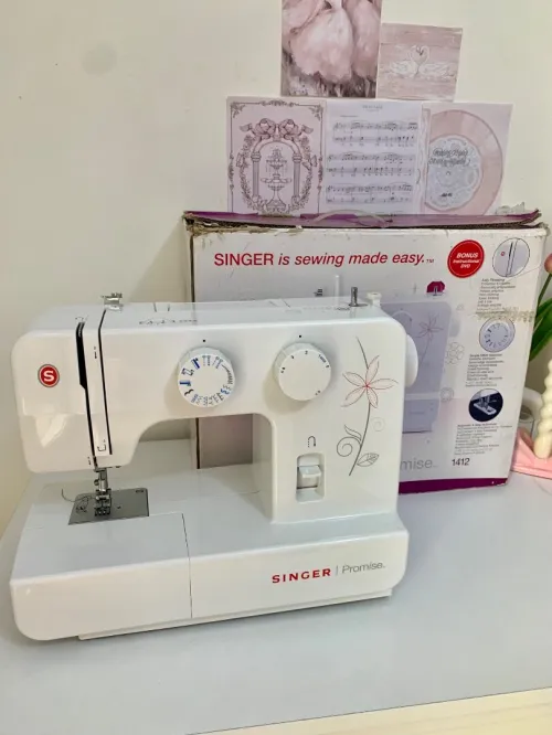 Machine à coudre singer promise 1412